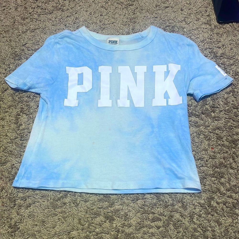 Barely worn and fits as a crop top